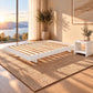 Malanya Bed with Curved Edges & Floating Legs in White, styled in a bedroom, bedside table not included - Chocolate Wood