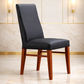 Teri Top Grain Leather Dining Chair in Black with Blackwood legs