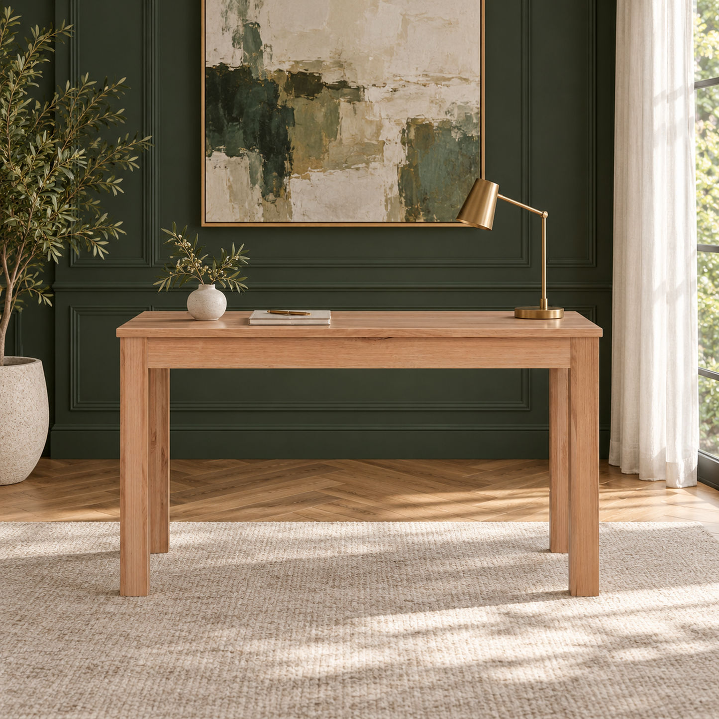 Zafran solid messmate timber writing desk 120cm with brass lamp against a dark green panelled wall - Chocolate Wood