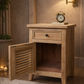 Pair of Villa rustic louvre style bedside tables by MyChocolateWood with one drawer and one door in recycled elm wood.