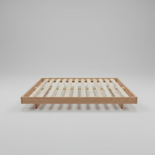 Solid Vic Ash bed by MyChocolateWood featuring curved edges and floating legs, finished with Danish oil, made to order.
