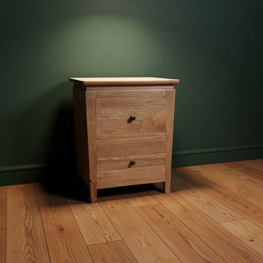 Two Ella solid oak bedside tables with two drawers by MyChocolateWood, showcasing natural wood grain and sleek design.