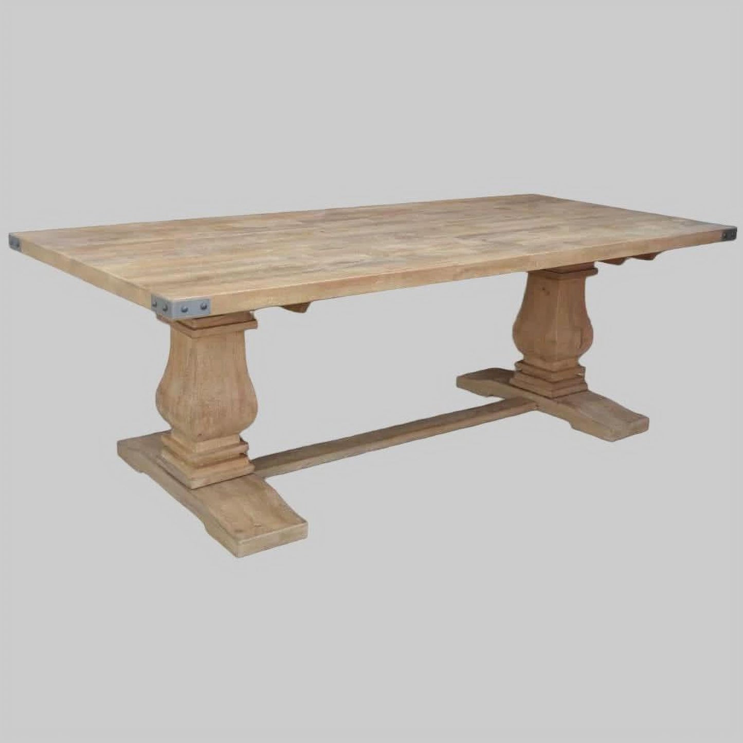 A rectangular pedestal dining table in honey wash wood, 230cm long, by Chocolate Wood, showcasing a smooth surface and sturdy design.