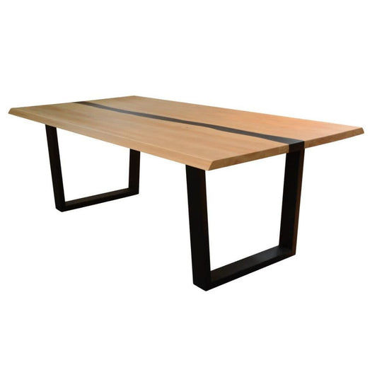 Solid rubberwood coffee table by MyChocolateWood with natural wood finish and black legs, 200cm long, in a modern living room setting.