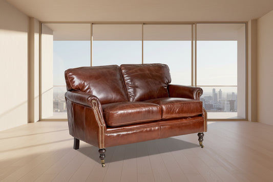 BUCKINGHAM AGED LEATHER 2-SEATER SOFA WITH BRASS STUD DETAILING - MyChocolateWood