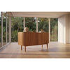 Solid teak sideboard with two doors in natural finish by Chocolate Wood, showcasing a sleek, modern storage piece.