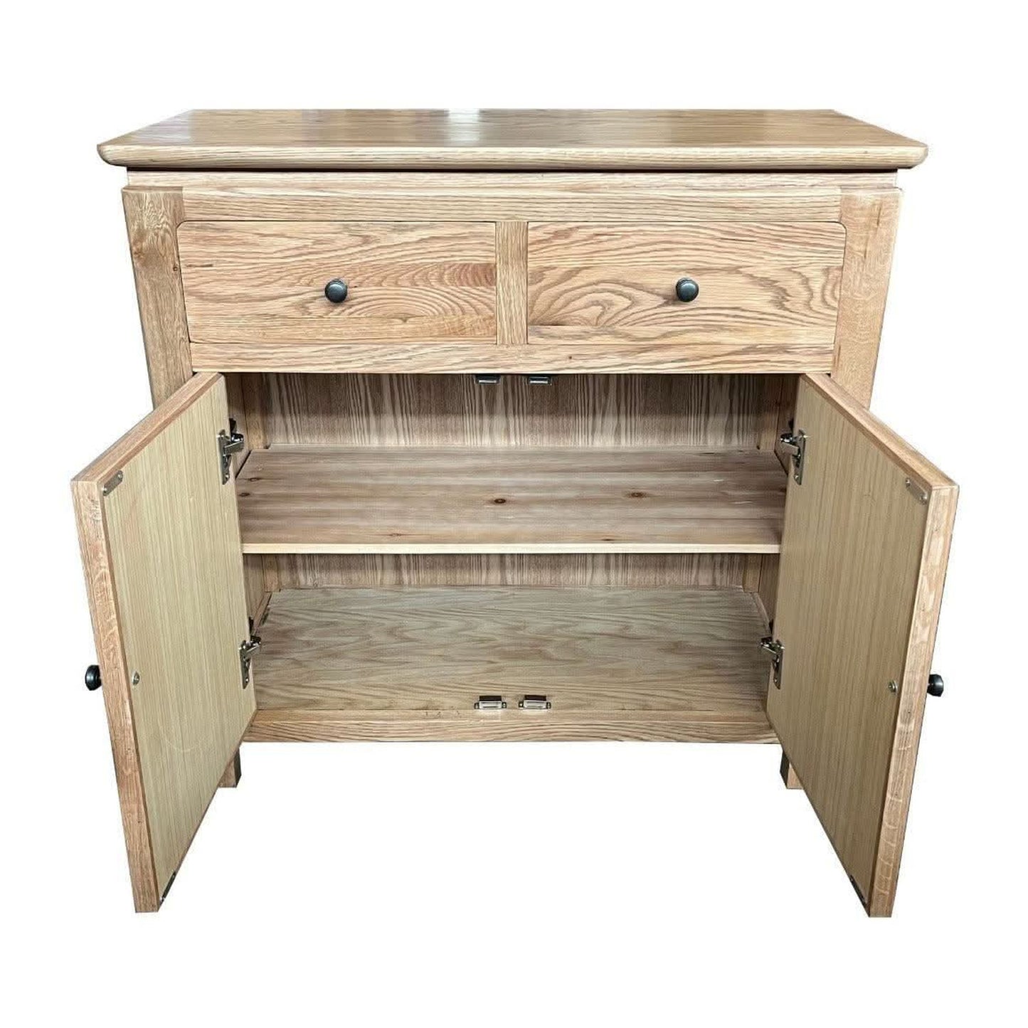 Ella solid oak cabinet by Chocolate Wood with two doors and two drawers, natural finish, showcasing a sleek, modern sideboard design.