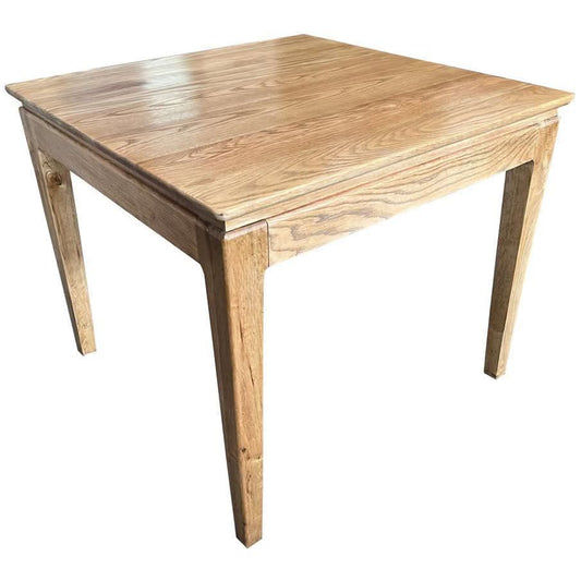 Solid oak Ella square dining table by MyChocolateWood with a 90cm surface, showcasing a natural wood finish and sturdy design.
