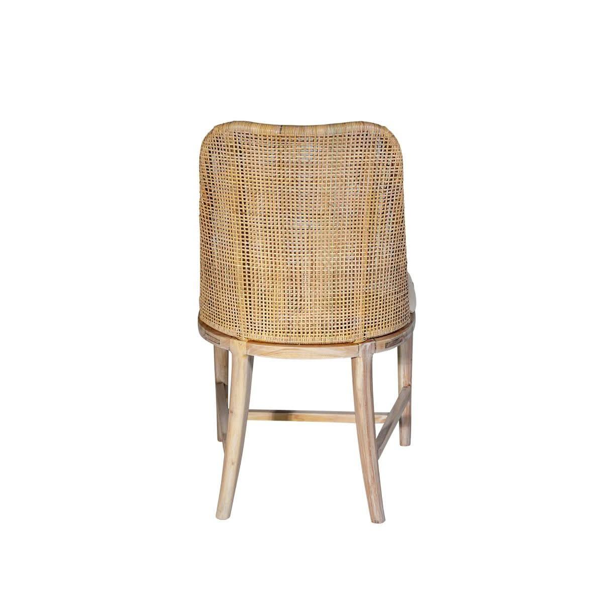Lancaster Hamptons solid Mindi wood frame rattan dining chair in whitewash by MyChocolateWood on a dining room setting.