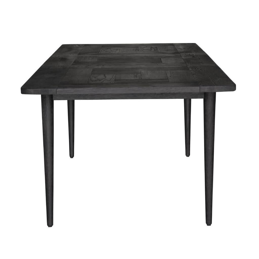 Medrano Oak Sandblasted Black Extension Dining Table by MyChocolateWood, showing the sleek black finish and extendable design in a modern dining room.