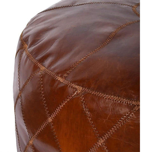 RONNIE ROUND OTTOMAN IN AGED LEATHER WITH DIAMOND EMBROIDERY DETAILING
