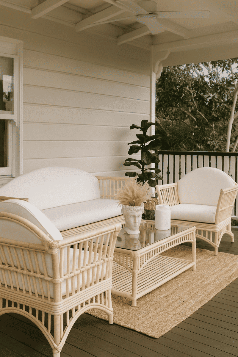 Natural rattan armchair with white cushion from Denize Hamptons collection by MyChocolateWood, featuring a stylish easy chair design.