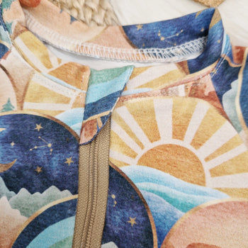 Boho rainbow printed sleepsuit with zip by Lottie & Lysh