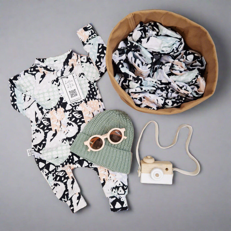 90s style dash art babygrow by lottie and lysh