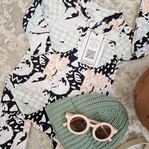 unisex 90s print babygrow handmade in the Uk