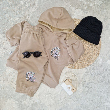 neutral beige coloured printed tracksuit by Lottie & Lysh