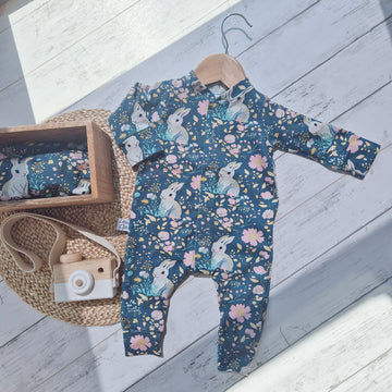 Baby girl outfit with florals and bunny rabbit print. 