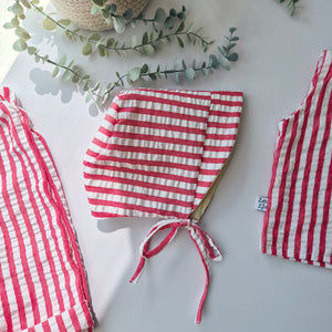 red and white striped seersucker bonnet for kids by Lottie & Lysh

