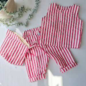 Toddler bonnet in red and white striped seersucker fabric
