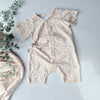 beige animal print baby romper by Lottie & Lysh
