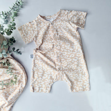 beige animal print baby romper by Lottie & Lysh
