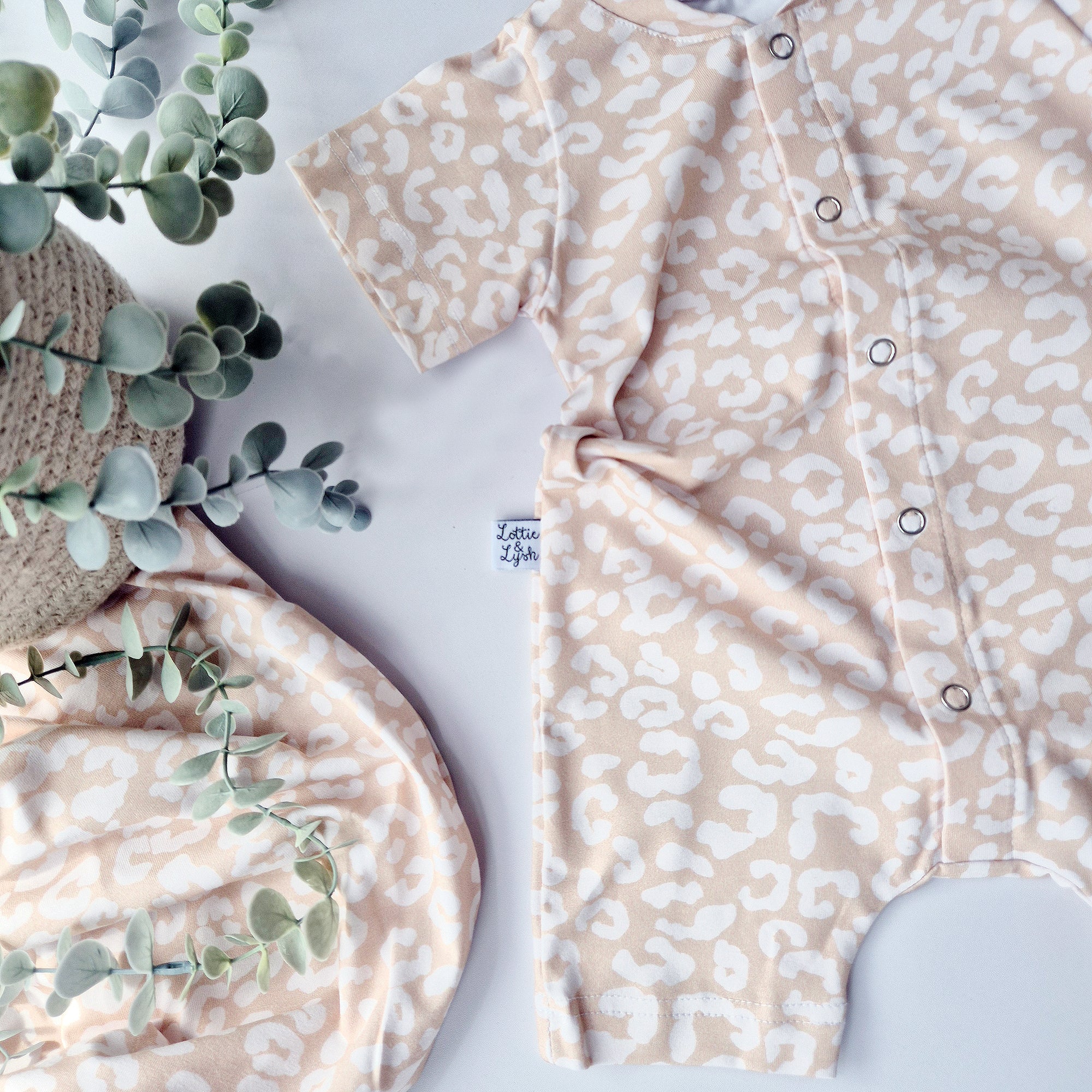 Sand leopard print baby romper by Lottie & Lysh