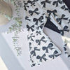 Close up product image of Lottie & Lysh black and white bow print flares