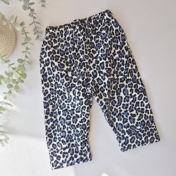 baggy toddler trousers in blue, white and black leopard print fabric