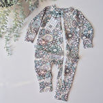 baby girl zip sleepsuit with floral pattern