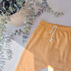elasticated waist mustard slouch leggings for boy and girls.
