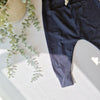 Navy harem leggings against a white background