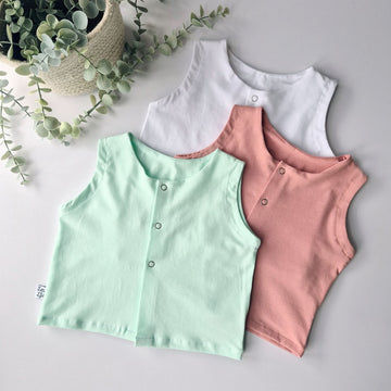 3 pack of baby and toddler popper front vests. Handmade in the UK by Lottie & Lysh