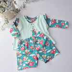 Children's pajama set with fairy and heart pattern on a light blue background