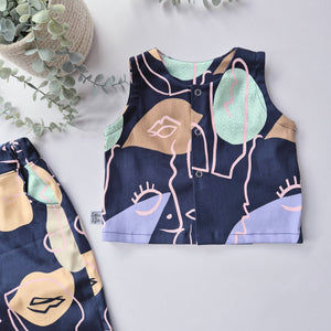 Children's sleeveless top with abstract pattern on a navy background
