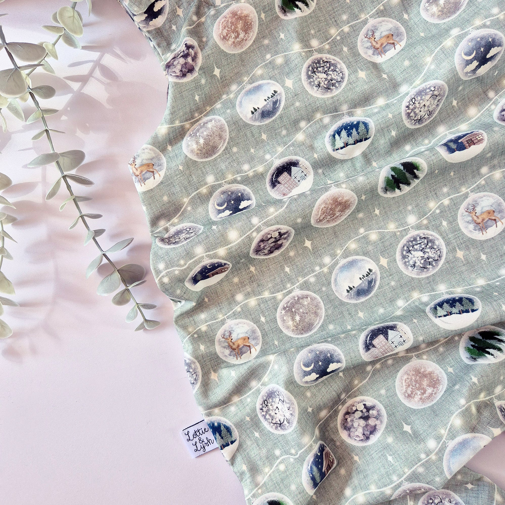 Bauble print baby and toddler clothing for christmas.