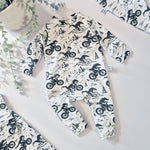 Alternative style baby romper featuring dragons on motorbikes. Sustainably made in the UK by Lottie & Lysh, Cornwall.