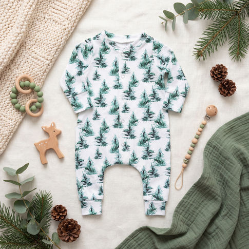 flat lay image of tree print babygrow by Lottie & Lysh
