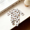 Baby romper with fox pattern on a white surface