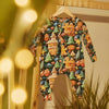 christmas babygrow hanging on a hanger