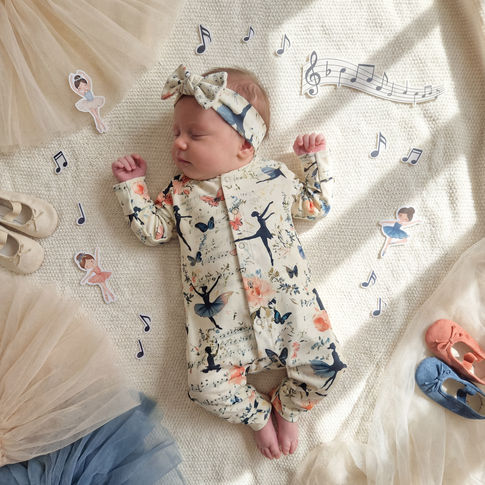 ballerina print romper with matching headband.