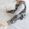 baby boy wearing Lottie & Lysh elephant print romper