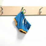 blue unisex kids shorts with mustard cuffs handmade in the uk