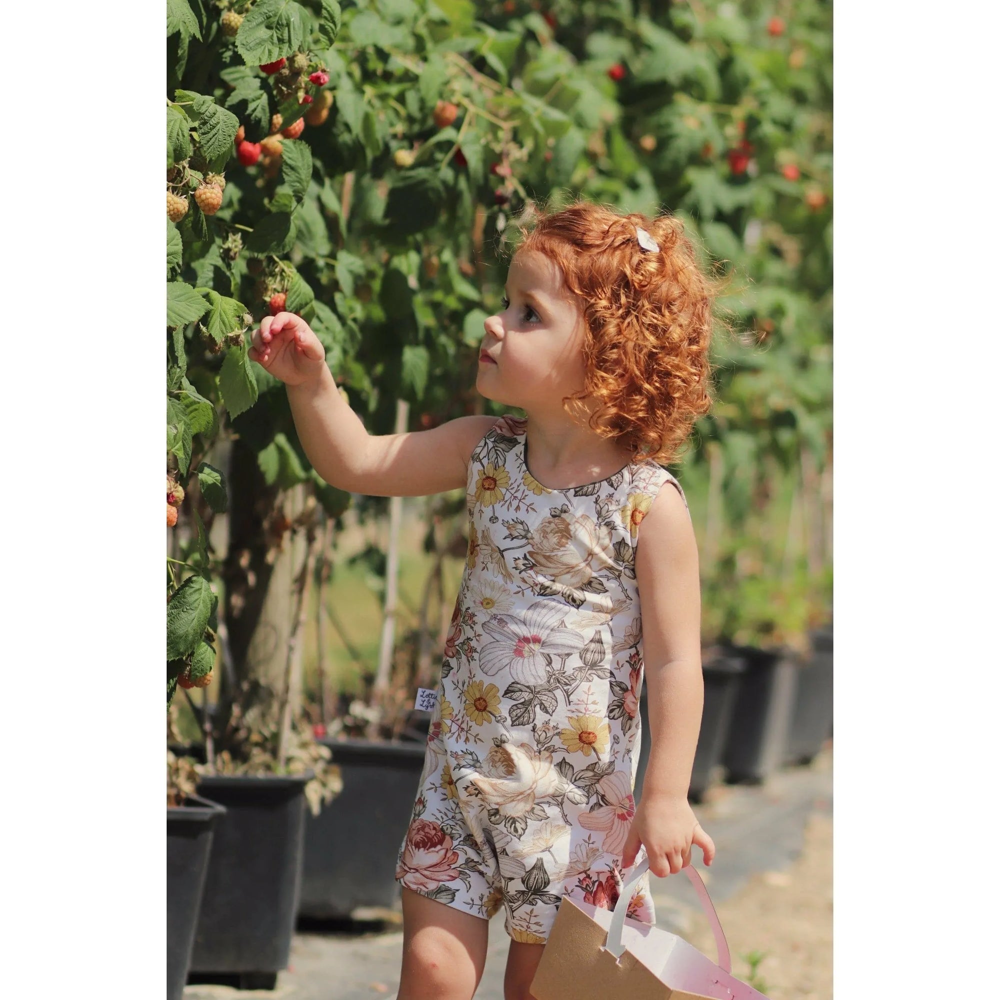 bow back girls playsuit