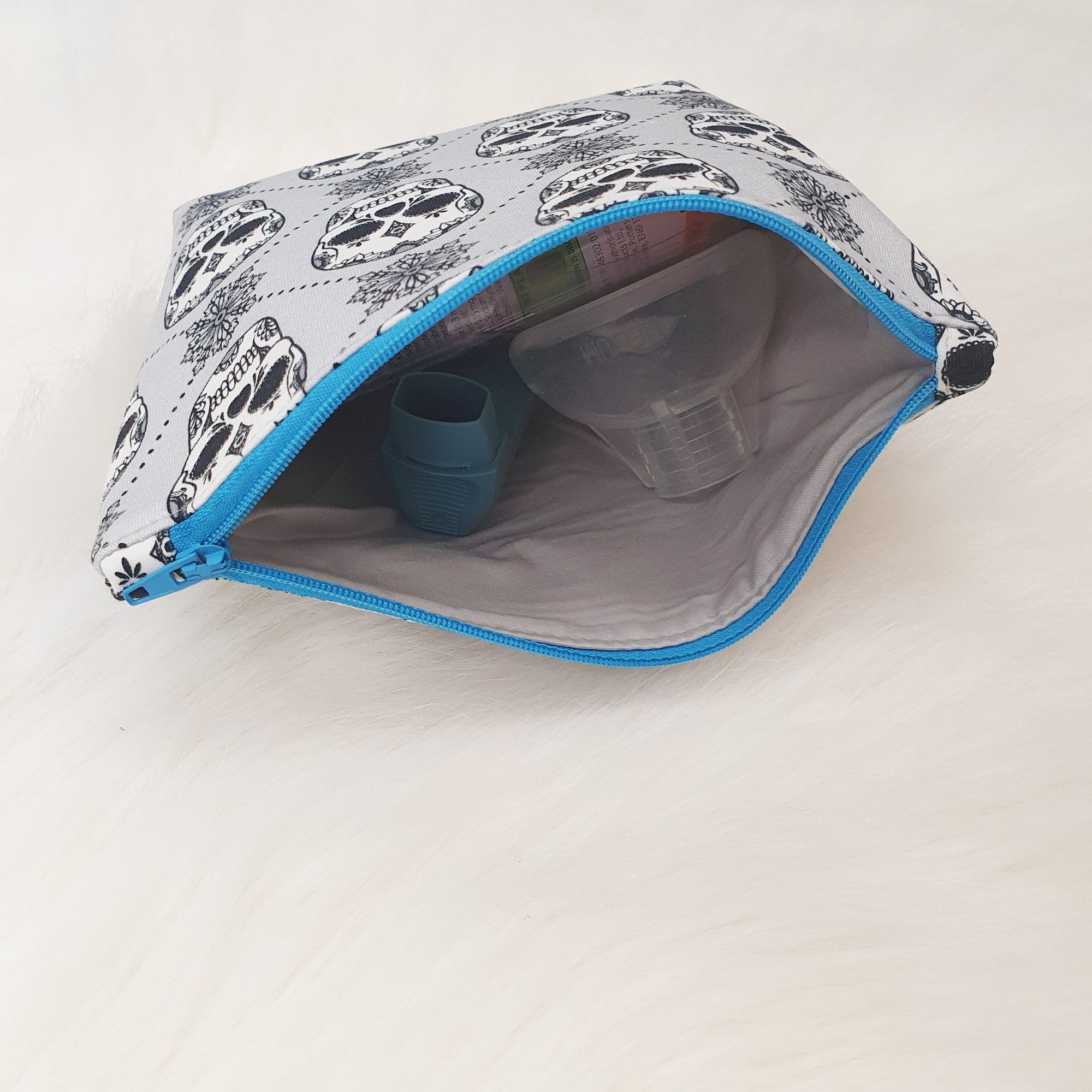 zipped bag for storing inhalers and medicines