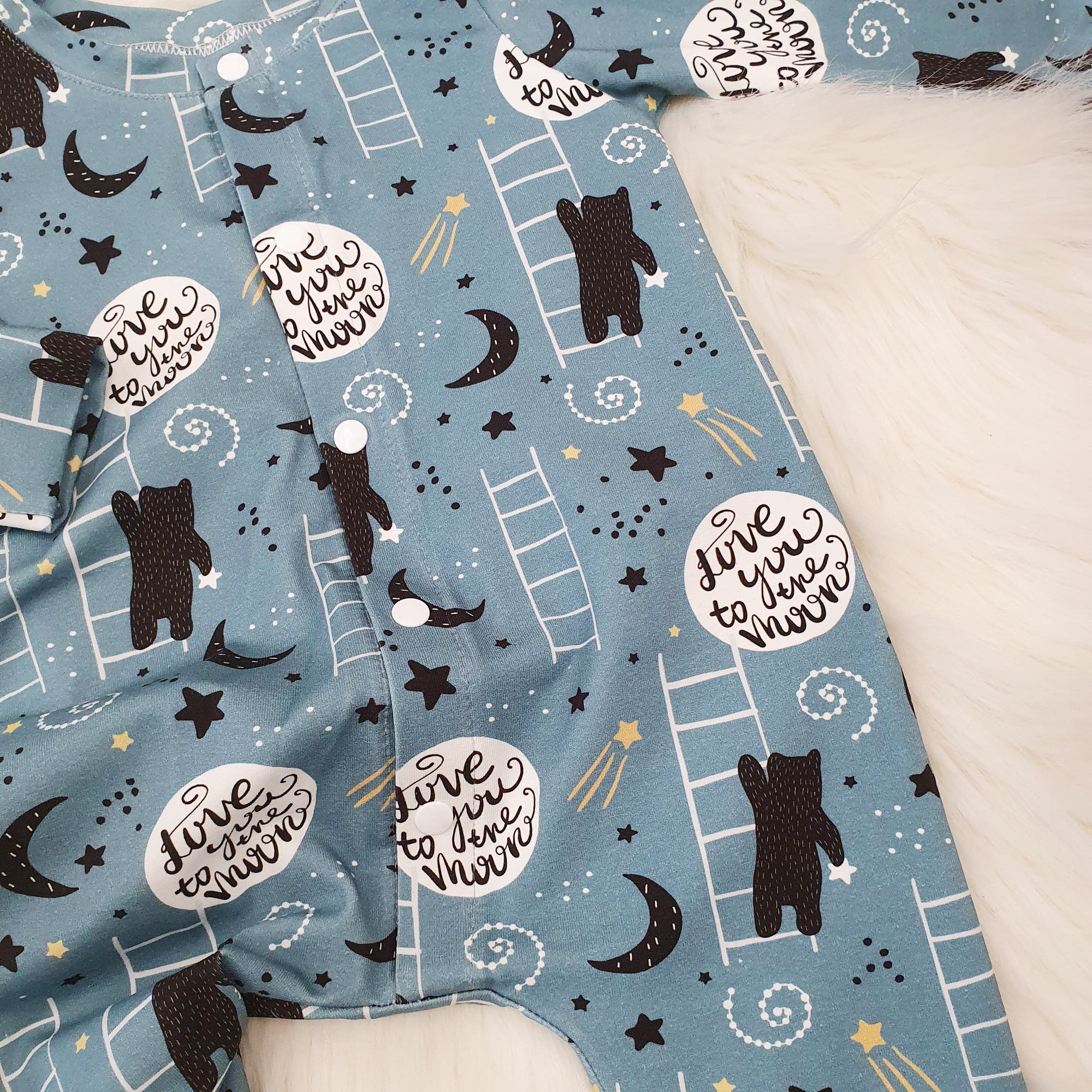 Blue jersey fabric with love you to the moon bear print design by Lottie & Lysh