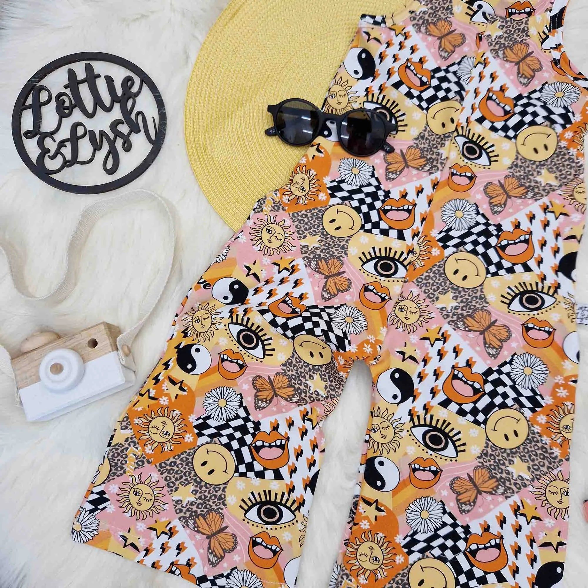 Kids flat lay image featuring the Lottie & lysh 70 aesthetic wide leg jumpsuit