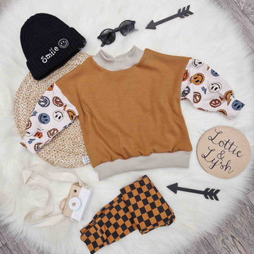 Boys oversized sweatshirt with smiley face sleeves by Lottie & Lysh