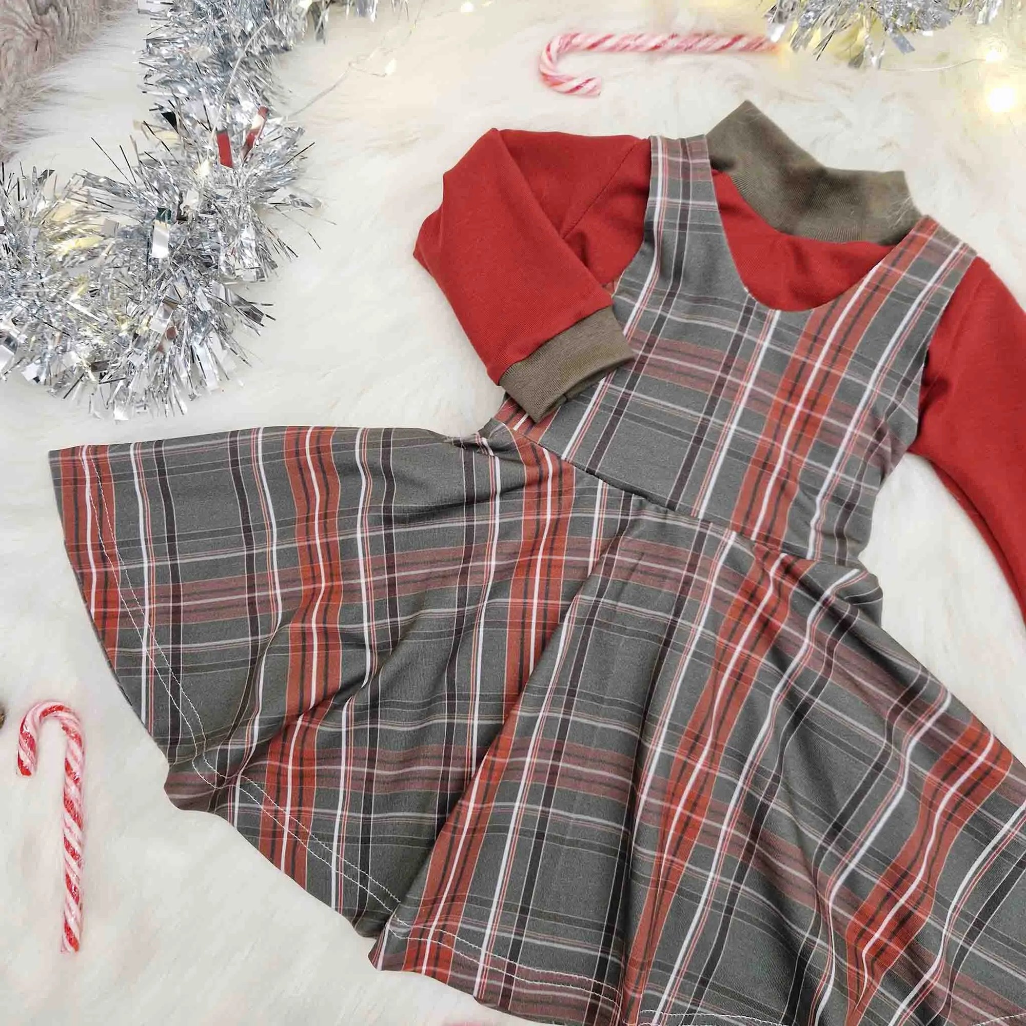 christmas day outfit flatlay featuring Lottie & Lysh tartain pinafore dress with matching top