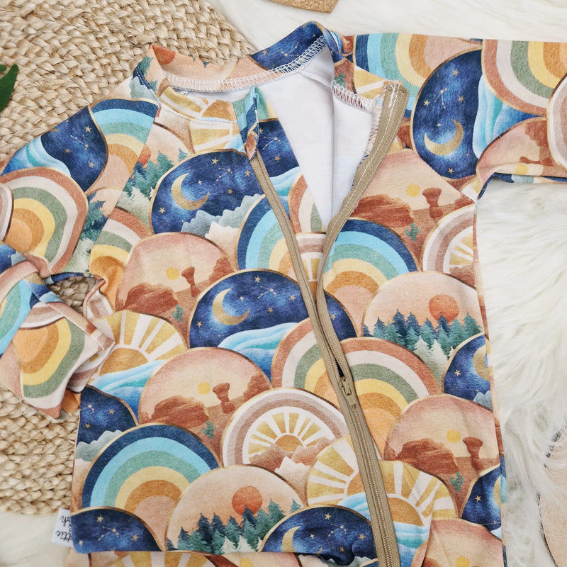 2-way zip sleepsuit with rainbows