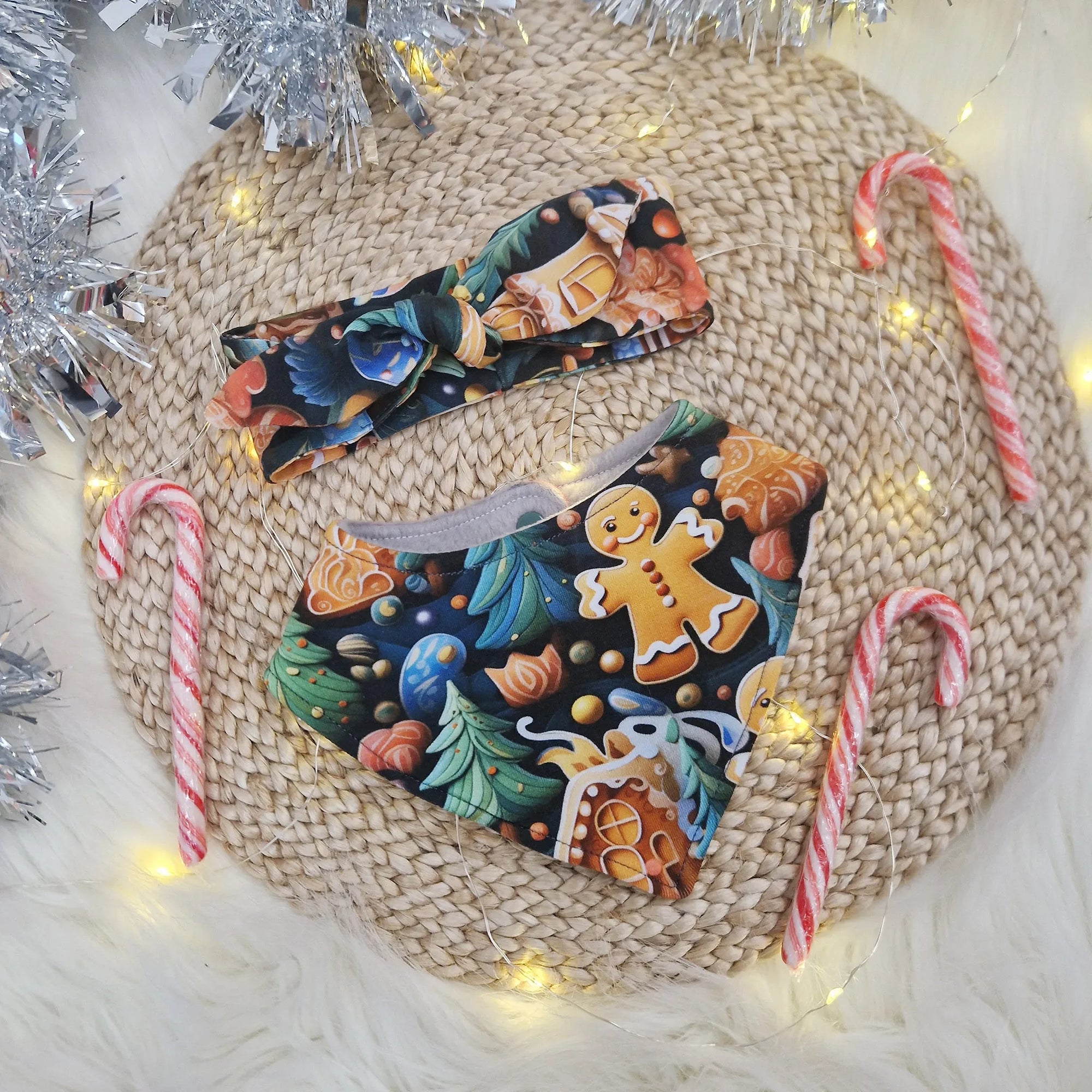 babies bandana bib and matching headband both featuring a festive gingerbread print